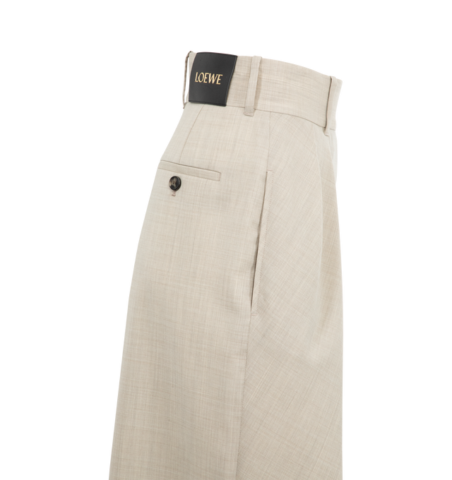 Image 3 of 4 - NEUTRAL - LOEWE Wrap Trousers featuring an asymmetric construction with a wrap front, regular fit, cropped length, high waist, loose leg, concealed hook fastening, seam pockets, buttoned rear welt pocket, pleats at the front and LOEWE embossed leather patch placed at the back. Made in Italy.