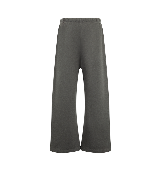 Image 2 of 3 - GREY - Fear of God ESSENTIALS Men's Signature Flare Sweatpant is crafted from heavyweight 380 GSM cotton-blend fleece and features a relaxed-fit silhouette that extends into a flared leg. Designed with the Essentials signature logo embroidered at the leg, this elevated loungewear style is finished with an encased elastic waistband, elongated drawcords, side-seam pockets, and a signature Essentials label at the center front. Main Material: 80% Cotton, 20% Polyester, 380 GSM.
