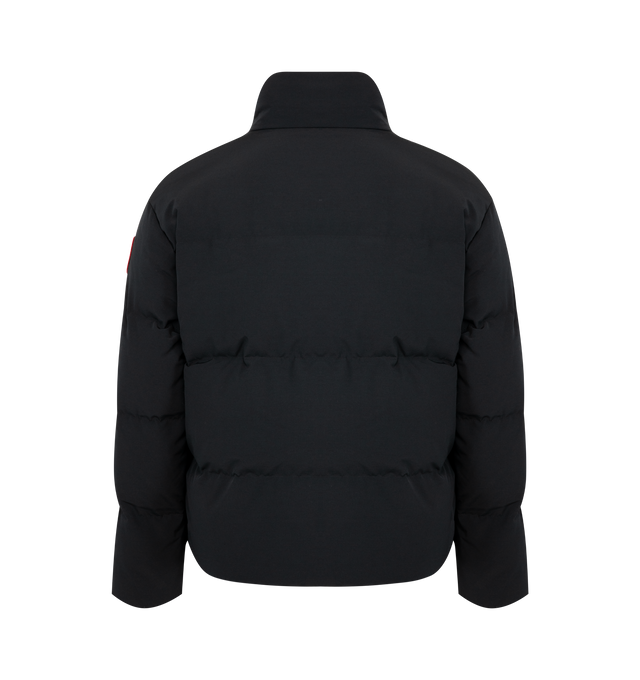 Image 2 of 4 - BLACK - CANADA GOOSE Bayview Parka Black Label featuring placket with snap buttons over two-way zipper, recessed rib-knit cuffs, brushed tricot-lined chin guard, hem with interior drawcord, interior backpack straps for hands-free carrying capabilities, two exterior fleece-lined pockets with snap closures, two interior mesh drop-in pockets and one zippered security pocket. 85% recycled polyester, 15% organic cotton.