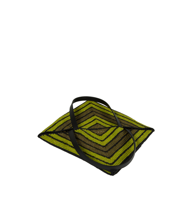 Image 4 of 4 - GREEN - LOEWE PAULA'S IBIZA Puzzle Fold Tote x- Large takes the iconic bags signature geometric lines and reimagines them in graphic and architectural panels that allow the bag to fold completely flat, making it the perfect travel companion. Soft, lightweight and inventively crafted, it features mixed stripes, calfskin handles and is finished with gold metal LOEWE branding. This XL version is made in Spain using raffia palm that is cultivated, harvested, sun-dried and woven in Madagascar by l 