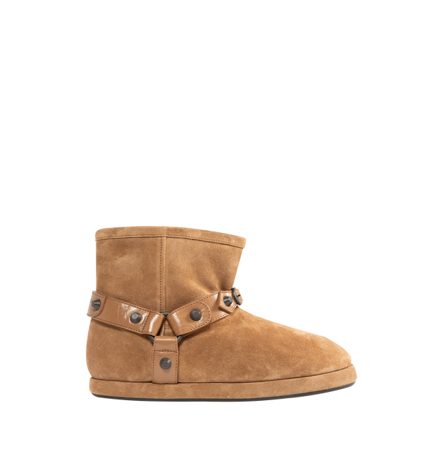 Image 1 of 4 - BROWN - BALENCIAGA Alaska Soft Bootie featuring split calfskin, wool and synthetic material, round toe, harness on the upper with studs and buckles in abs, Balenciaga logo debossed on the back and tone-on-tone sole. Upper: calfskin. Sole: TPU, bio-based TPU. Insole: wool, polyester, acrylic. Made in Italy.
