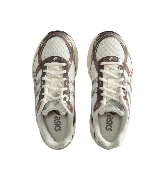 Image 5 of 5 - NEUTRAL - Asics Unisex Gel-1130 Sneakers feature patent leather overlays, clear gloss TPU accents, and breathable mesh underlays for a modern look. Enhanced with cushioning and support designed for all-day comfort, the GEL-1130 delivers the perfect blend of heritage performance and everyday wearability. Main Material: Mesh Upper with Patent Leather and Gloss TPU Overlays. Cushioning: GEL Technology. Details: GEL-1000 Series Heritage Design, Breathable Mesh Construction *Unisex style in men's