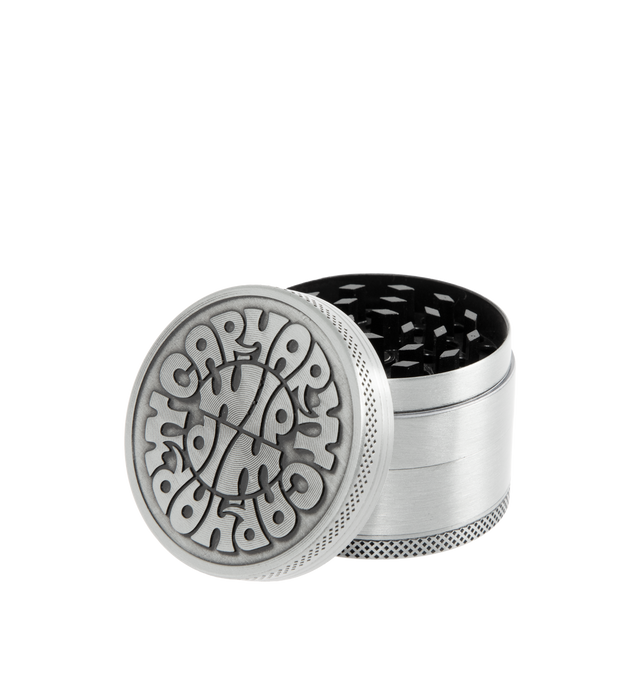 Image 1 of 2 - SILVER - CARHARTT WIP Jazzy Grinder constructed from zinc alloy and made up of four compartments, including a fine screen. The item features an embossed graphic on the surface and a lasered logo on the base. 2 x 1.6 inch. 100% zinc alloy.
