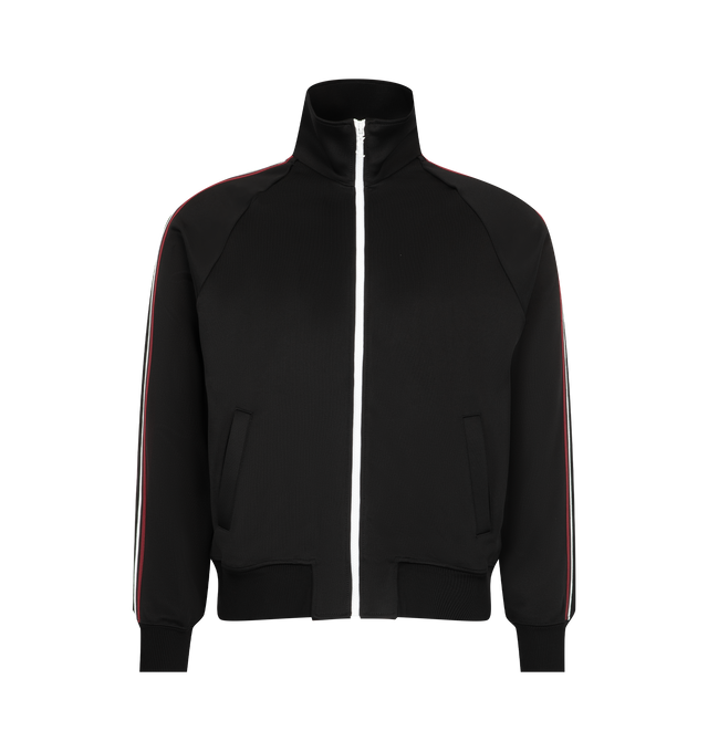 Image 1 of 3 - BLACK - Saint Laurent Mens Tracksuit Jacket is crafted from a viscose blend. Features a stand collar, front Cassandre zip closure, raglan sleeves with contrast piping, front welt pockets, and ribbed cuffs and hem. Main Material: Viscose, Polyamide, Elastane. Made in Italy.