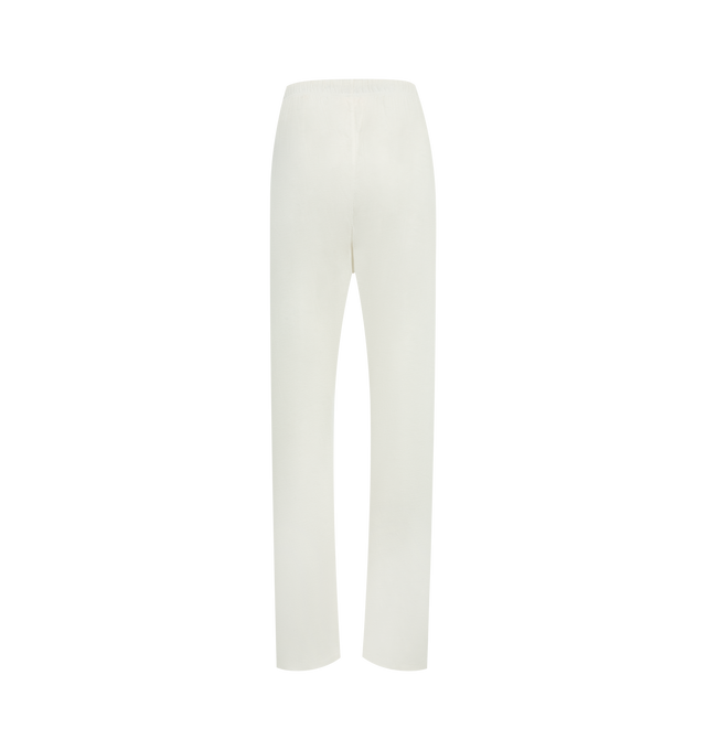 Image 2 of 3 - WHITE - FEAR OF GOD ESSENTIALS Jersey Flare Sweatpant featuring lightweight core jersey, relaxed silhouette that extends into a flared leg, embroidered script Essentials logo on the leg and a Fear of God Essentials label at the center front. 60% cotton, 40% polyester.