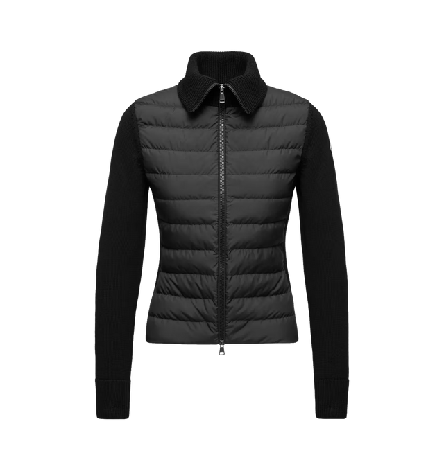 Image 1 of 1 - BLACK - Moncler Women's Padded Zip-Up Wool Cardigan is crafted from plush virgin wool and features warm down-filled polyester panels at the front and back, allowing it to double as lightweight outerwear during transitional weather. Designed with a point collar and zip-front closure, this designer cardigan combines soft knit construction with Moncler's signature down insulation. Base Fabric: 100% Virgin Wool. Outer Front and Back: 100% Polyester. Front and Back Lining: 100% Polyester. Padding: