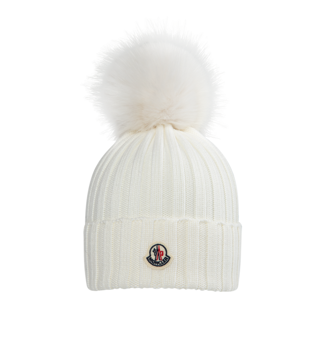 Image 1 of 1 - WHITE - MONCLER Wool Beanie with Pom Pom featuring Merino wool, ribbed knit and faux fur pom pom. 100% virgin wool.