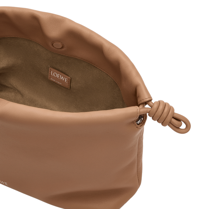 Image 5 of 6 - BROWN - LOEWE Medium Flamenco Purse featuring a lightweight and soft bag with a ruched shape, historical knot drawstrings, shoulder, crossbody or hand carry, detachable donut chain with Anagram Pebble, detachable and adjustable leather strap, magnetic closure, suede lining and embossed LOEWE. Mellow nappa lambskin. 20 cm x 30 cm x 10.5 cm. Made in Spain.