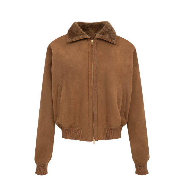 Image 1 of 3 - BROWN - Acne Studios Women's Shearling Bomber Jacket is crafted from lamb shearling and features a relaxed-fit silhouette with a below-waist length, a funnel neckline, and dropped shoulders. Designed with a two-way zip closure, welt pockets, and ribbed trims at the waist and cuffs that create a gathered effect, this elevated outerwear style is finished with a metal logo plaque at the back neckline. Main Material: 100% Lamb Shearling. Contrast: 100% Goat Leather.