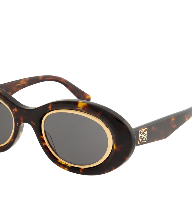Image 3 of 3 - BROWN - LOEWE Mini Anagram Oval Sunglasses featuring mini oval-shape, acetate with a metal inner rim, adjusted fit, UVA/UVB protection and gold-finish metal Anagram. Acetate. Made in Italy.