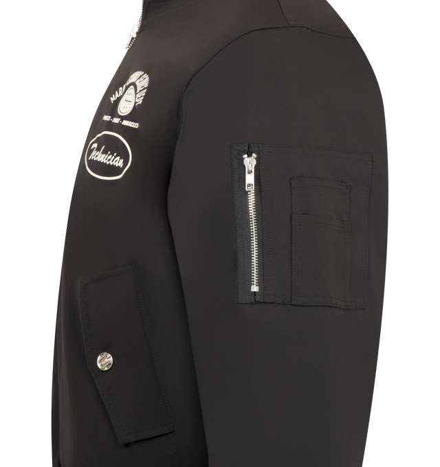 Image 3 of 4 - BLACK - MARKET Handyman Reversible Bomber Jacket featuring a reversible design with a solid and camo print, a full zipper front closure, long sleeves, side hand pockets, and a ribbed collar, cuffs, and hem for a classic look. Nylon.