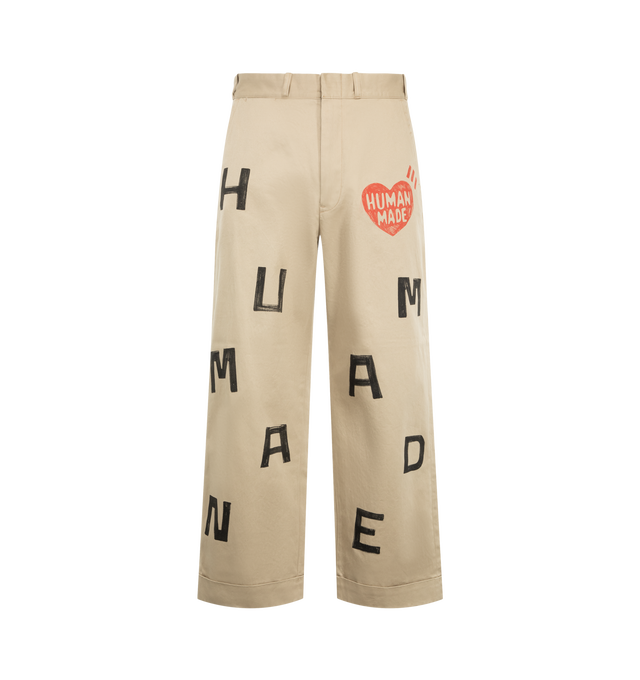 Image 1 of 3 - NEUTRAL - Human Made Men's Wide Fit Chino Pants are crafted from high-density cotton chino cloth and feature a wide-leg silhouette with a high-rise waist and relaxed fit. Designed with a crisp handfeel and subtle sheen, these statement trousers are detailed with hand-painted-style graphic artwork, a printed brand message inside the back waistband, and a signature heart-shaped button at the back left pocket. Main Material: 100% Cotton.
