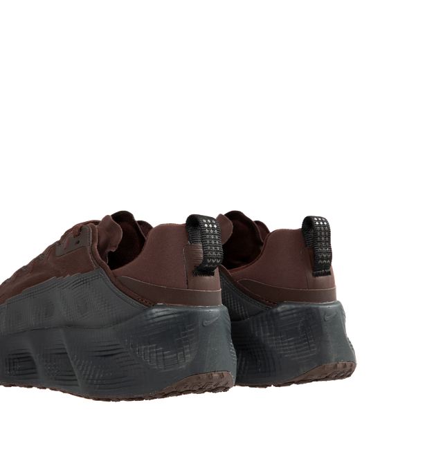 Image 3 of 5 - BROWN - NIKE Ava Rover Sneaker featuring a stacked ReactX midsole, an ultralight outsole, breathable upper, Locked-Down Fit, mudguards wrap around the upper, perforations on the top, responsive cushioning, oversized midsole, engineered traction and a thin layer of rubber on the outsole.