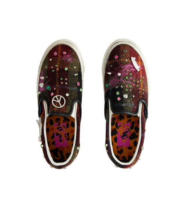 Image 5 of 5 - MULTI - Vans Unisex Premium Classic Harris Tweed Slip-On Sneakers are crafted from Harris Tweed woven from 100% virgin wool and feature the brand's iconic laceless slip-on silhouette, elastic side panels, and a padded collar for enhanced comfort. Designed with jewel, pin, and stud embellishments, contrast stitching, and a subtly distressed finish. Main Material: Harris Tweed 100% Virgin Wool. Outsole: Rubber. Details: Jewel, Pin, and Stud Embellishments. *Unisex style in men's sizing.