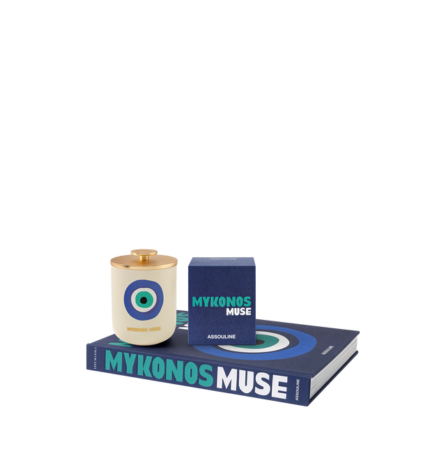 Image 4 of 5 - MULTI - Assouline Mykonos Muse - Travel From Home Candle. Bathe in the idyllic shores of Mykonos with the aroma of fresh green fig, warm tonka, sweet almond, and herbaceous cyclamen, as this exquisite blend evokes the allure of hidden coves and charming whitewashed villas. Material: Ceramic Vessel. Wax Family: Soy, Coco, Paraffin Blend. Approximate Burn Time: 50 Hours. Weight: 11.25 oz (318.02 g). Dimensions: 4 x 3.37 in (10.16 x 8.56 cm).