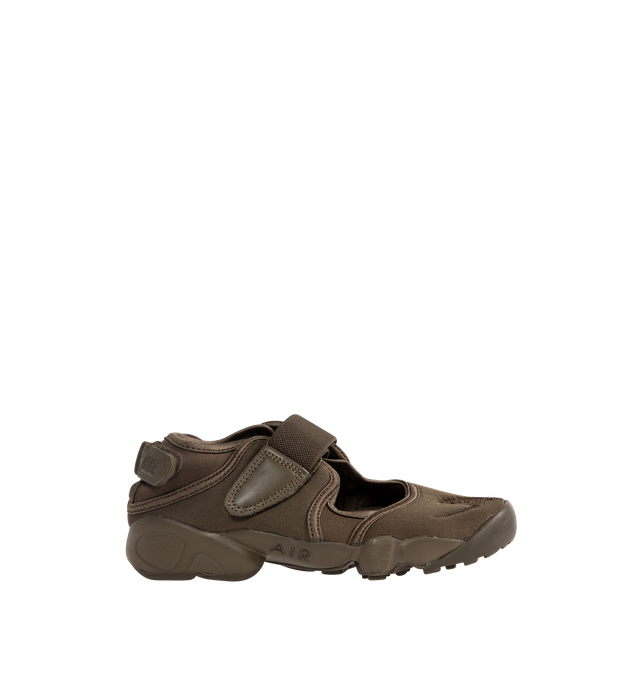 Image 1 of 5 - BROWN - NIKE Air Rift Sneaker featuring hook-and-loop straps on the midfoot and heel, Nike Air unit in the heel combined with plush foam, rubber detailing on the outsole, upper features a blend of elastane, polyester and nylon materials for a flexible fit and split toe design.