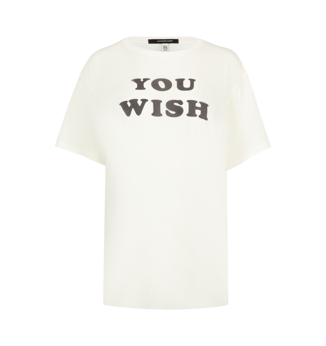 Image 1 of 2 - WHITE - R13 You Wish Boy Tee featuring round neck, short sleeves, graphic text on front and loose fit. Cotton.