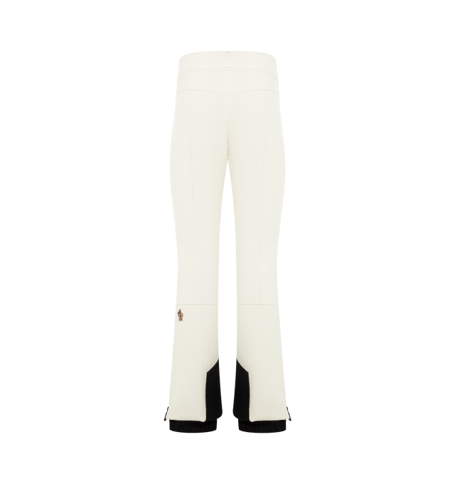 Image 2 of 4 - WHITE - MONCLER GRENOBLE Ski Pants featuring 3L 4-way stretch technical poplin, YKK AquaGuard highly water-resistant zipper and snap button closure, pockets with YKK AquaGuard highly water-resistant zipper closure, cuffs with YKK AquaGuard highly water-resistant zipper closure, powder cuffs, skicut hem protection and silicone logo. 68% polyester, 24% polyamide/nylon, 8% elastane/spandex. Made in Romania.