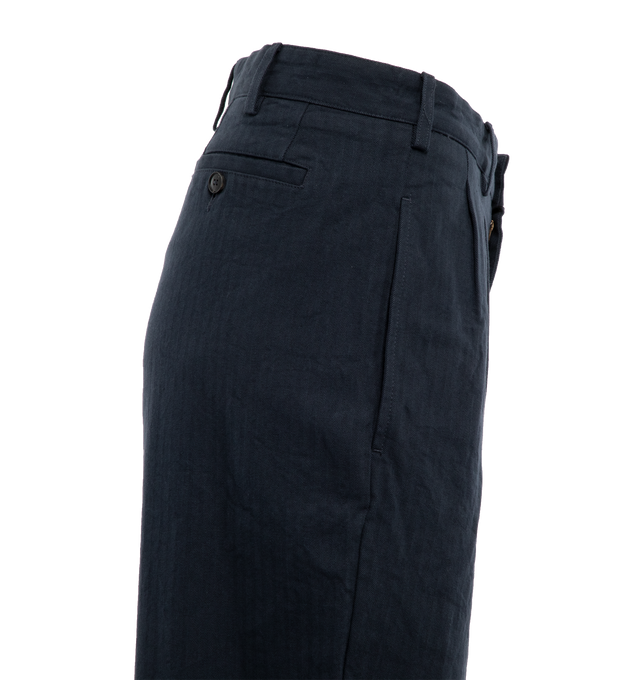 Image 3 of 3 - NAVY - NOAH Double-Pleat Herringbone Pant featuring double-pleated front with zip-fly and button closure, side seam pockets and besom back pockets with button closures. 100% cotton. Made in Portugal. 