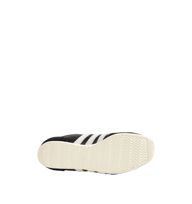 Image 4 of 5 - BLACK - ADIDAS Japan Sneakers are a lace-up style with leather uppers, EVA midsoles, molded heels, and rubber gum soles. Reissued vitage design from a 1964 trainer that appeared in a catalog for that year's global sporting event held in Japan. Unisex style in men's sizes.