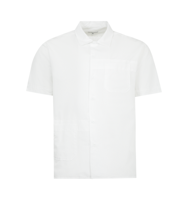 Image 1 of 2 - WHITE - ENGINEERED GARMENTS Camp Shirt featuring short-sleeves, a relaxed open collar, diagonally positioned patch pockets and button closure. 100% cotton. Made in USA.