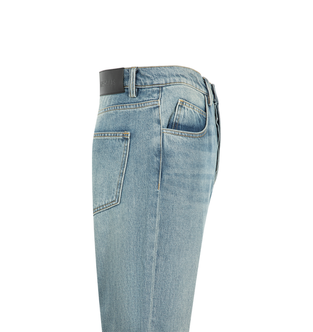 Image 3 of 4 - BLUE - Nahmias Men's High Tide Split Seam Straight Leg Jeans are crafted from 100% cotton denim and feature a straight-leg silhouette with signature split-seam construction. Designed in a medium indigo wash, these designer jeans are finished with a waxed hem that creates a distinctive wet, just-out-of-the-water effect and a Summerland label detail at the split seam. Main Material: 100% Cotton. Fit: Straight Leg. Closure: Button. Details: Waxed Hem, Summerland Label at Split Seam. Care: Profes