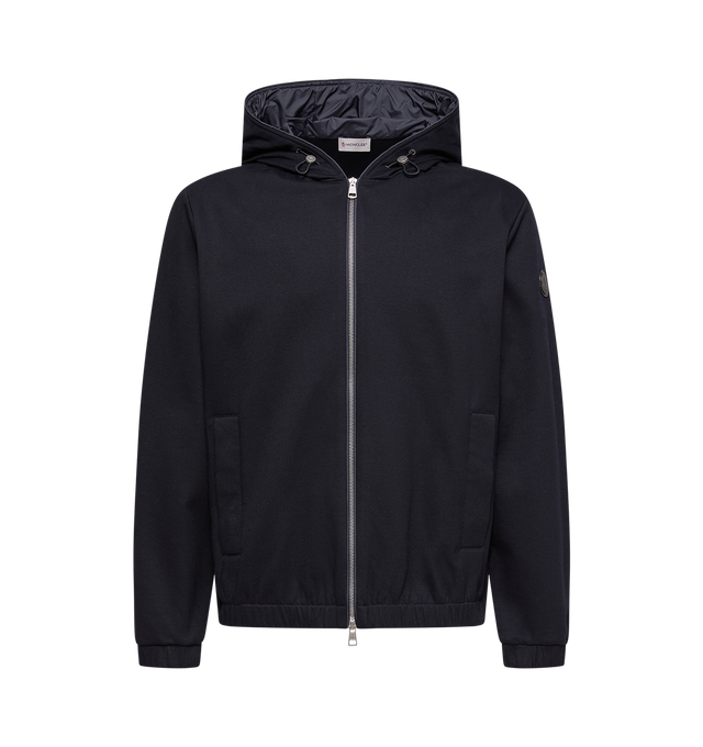 Image 1 of 2 - BLUE - MONCLER Cotton Blend Zip-Up Hoodie featuring cotton and nylon blend double jersey, hood, front and zipper lining in nylon, adjustable hood, zipper closure, side pockets, elastic cuffs and hem and double leather logo patch. 90% cotton, 10% polyamide/nylon. Made in Italy.