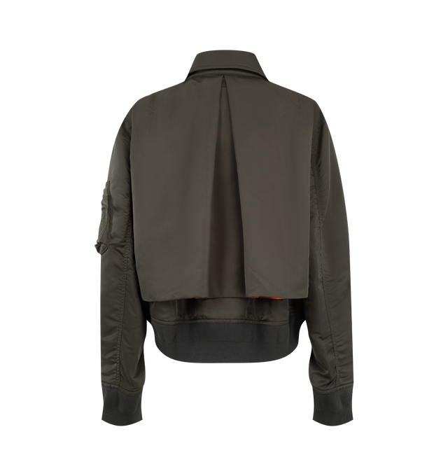 Image 2 of 4 - BROWN - Sacai Nylon Twill Blouson is crafted from nylon twill with lightweight padding. Features a blouson silhouette, mixed-media paneling, full lining, and modern utility-inspired construction. Outer: 100% Nylon; Parts: 55% Polyester, 44% Cotton, 1% Polyurethane; Lining: 100% Polyester; Filling: 100% Polyester. Made in Japan.