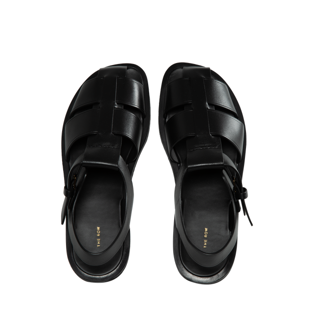 Image 4 of 4 - BLACK - THE ROW Fisherman Sandal featuring seamless strap construction and covered adjustable buckle closure. 100% Leather. Rubber sole. Made in Italy. 