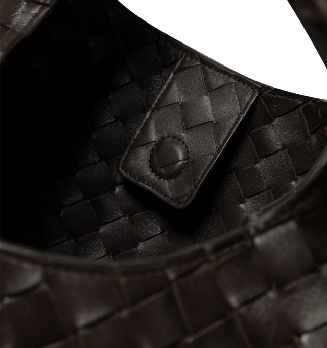 Image 3 of 3 - BROWN - Bottega Veneta Womens Large Campana Shoulder Bag is crafted from supple Intrecciato leather. Features an archival silhouette, leather tie closure with hidden magnetic fastening, one internal zip pocket, unlined interior, and brass-finish hardware. Main Material: Leather. Dimensions: 24 cm H x 39 cm W x 18.5 cm D (9.4" H x 15.4" W x 7.3" D). Handle drop: 25 cm (9.8"). Fits up to a 13" laptop. Made in Italy.