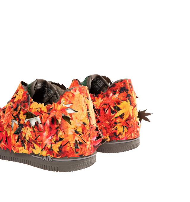 Image 3 of 6 - MULTI - NIKE Air Force 1 '07 Sneaker featuring leaves applied as an outer layer that is intended to be tearaway in certain places over time, slowly uncovering the golden-brown hairy suede base color underneath in the design that suggests fallen leaves on the forest floor being absorbed back into the soil.