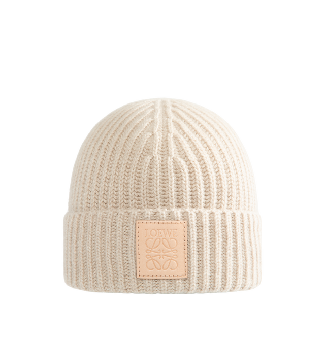 Image 1 of 2 - NEUTRAL - Loewe Men's Beanie is crafted from light beige ribbed cashmere knit and features a short silhouette with a turn-up cuff. A Loewe leather patch at the front completes the design. Main Material: 100% Cashmere. Made in Italy.