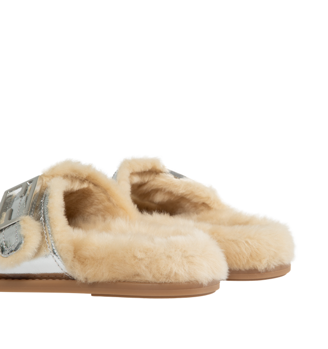 Image 3 of 4 - SILVER - FENDI Feel Sandal featuring double-band flat slides with FF Baguette decorative buckles. Made of silver-laminate nappa leather. Beige sheepskin details. Palladium-finish metalware. 100% lamb leather. Inside: 100% sheep fur. Made in Italy. 