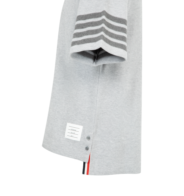 Image 3 of 3 - GREY - THOM BROWNE Textured Pique 4 Bar Tee featuring ribbed neckline, buttoned side vents with RWB grosgrain trim, stepped hem, engineered 4-bar detailing, name tag appliqu and signature striped grosgrain loop tab. 100% cotton. Made in Italy.