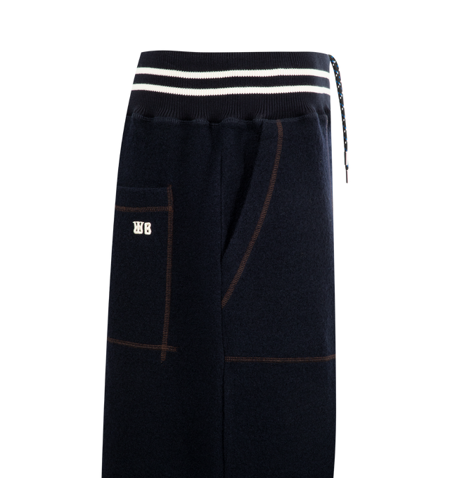 Image 3 of 3 - NAVY - WALES BONNER October Shorts featuring elasticated, striped waistband, patch pockets, rear patch pocket with logo motif and contrast overlocked top-stitching. Wool. Made in Portugal
