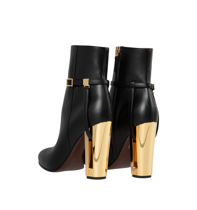 Image 3 of 4 - BLACK - FENDI Delfina Ankle Boots featuring round-toe, side zipper closure on the inside, heel with cut-out detail and gold-colored metal FF motif. 105MM. 100% calfskin. 