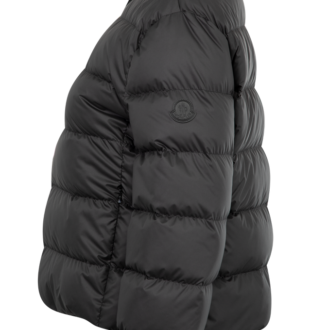 Image 3 of 3 - BLACK - MONCLER Mauvezin Down Puffer Jacket featuring quilted puffer jacket, heavy knit collar, gold-tone hardware, round neckline, long sleeves, tonal leather logo patch at left sleeve, side zip pockets, classic fit, hem sits at the hip, two-way zip-front. 100% polyester. Padding: 90% down, 10% feather.