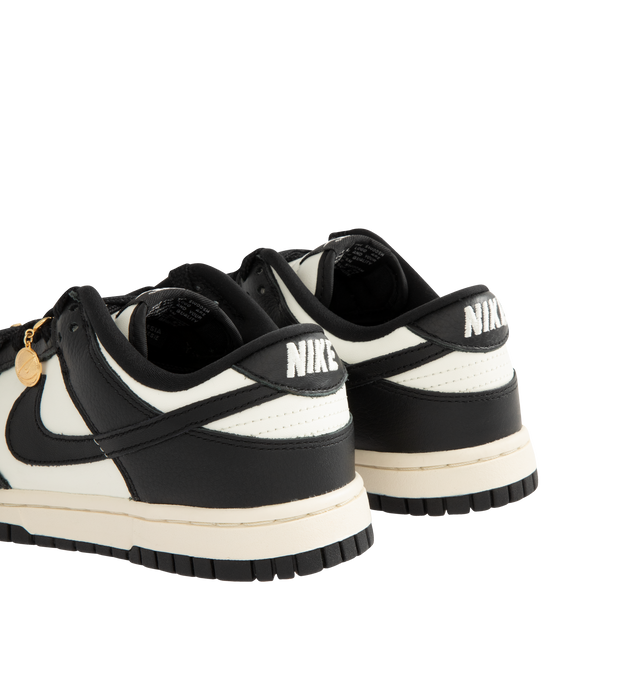 Image 3 of 5 - BLACK - NIKE Dunk Low SE Sneaker featuring charm details, plush padding, leather upper, foam midsole and rubber outsole with classic pivot circle.