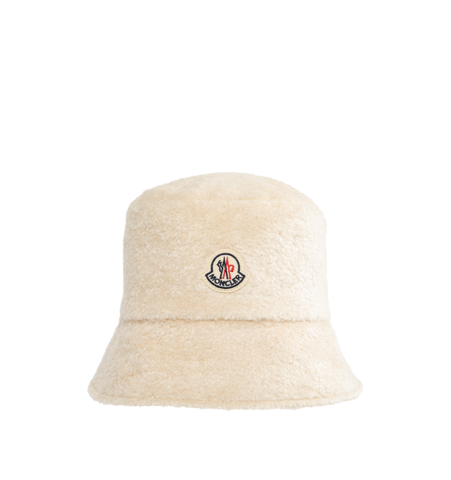 Image 1 of 2 - WHITE - MONCLER Teddy Bucket Hat featuring teddy fleece, nylon technique lining and logo patch. 60% acrylic, 40% cotton. Lining: 100% polyamide/nylon.