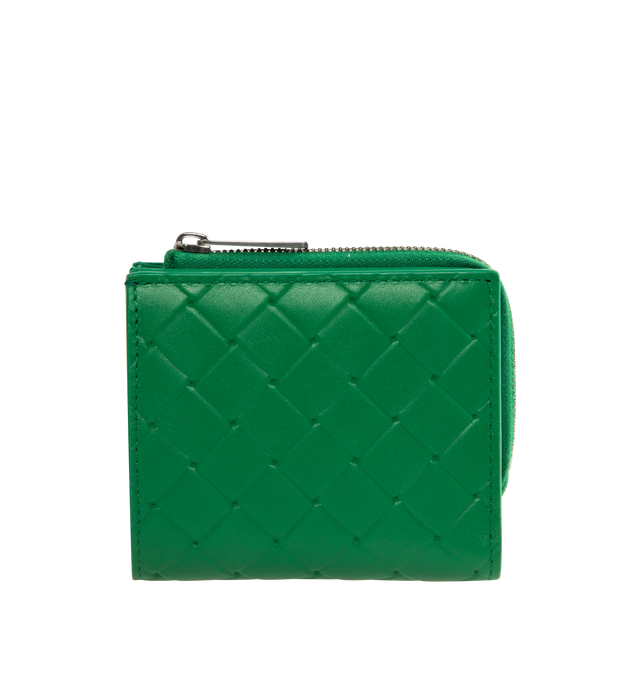 Image 1 of 3 - GREEN - BOTTEGA VENETA Bi-Fold Wallet in calf leather with embossed Intrecciato pattern featuring six card slots, one bill compartment, one zippered coin purse and press stud closure. Calfskin. Made in Italy.