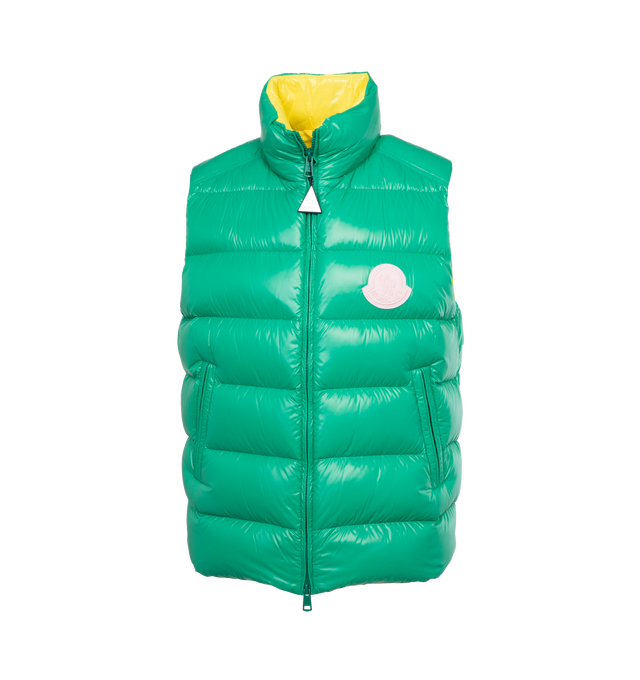 Image 1 of 3 - GREEN - MONCLER PARKE VEST is made from recycled nylon laqu, a lightweight fabric is down proof and water-repellent. The classic puffer vest features a logo patch on the chest, recycled lightweight nylon laqu lining, down-filled, zipper closure, zipped pockets and felt logo patch. Regular fit. Straight cut.EXTERIOR: 100% Polyamide / Nylon LINING: 100% Polyamide / Nylon PADDING: 90% Down, 10% Feather 