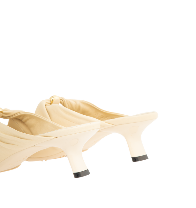 Image 3 of 4 - NEUTRAL - Loewe Women's Pebble Soft Mule in supple nappa lambskin with a flexible upper engineered for extra comfort, featuring a metallic pebble with an Anagram engraved detail, a signature petal toe shape, 45mm heel, engraved Anagram on Pebble, padded leather insole and Anagram embossed rubber outsole. Heel height: 4.5 cm. Nappa lambskin. Made in Italy.