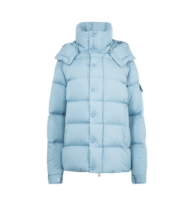 Image 1 of 4 - BLUE - MONCLER Maya 70 Hooded Short Down Jacket featuring recycled polyester, polyester lining, down-filled, detachable and adjustable hood, zipper and snap button closure, zipped pockets, sleeve pocket with snap button closure, adjustable cuffs, hem with drawstring fastening and logo. 100% polyester. Padding: 90% down, 10% feather.