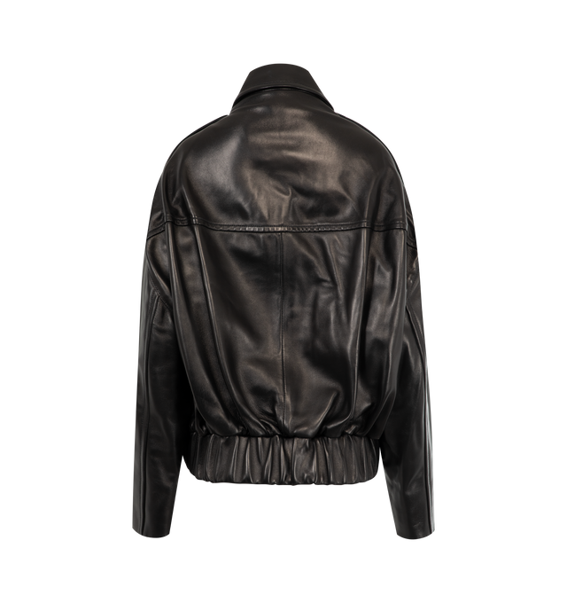 Image 2 of 3 - BLACK - KHAITE Owey Jacket featuring a sculptural bomber in exceptionally soft and lightweight plong leather, relaxed fit, rounded blouson silhouette, dropped shoulder seams, ruching at banded hem, elongated collar, epaulets, and sleeves, signature hardware at two-way zipper, patch pockets at front and lined in silky cupro twill. 100% lamb.