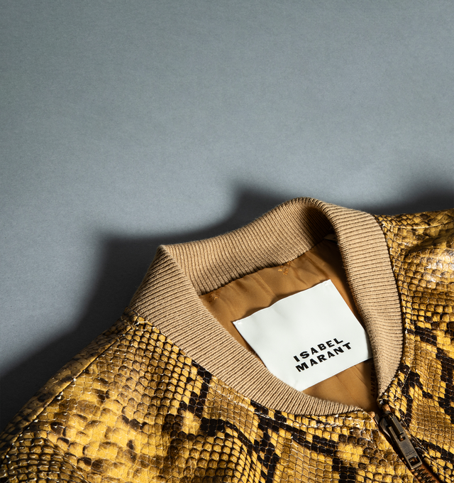 Image 5 of 6 - BROWN - ISABEL MARANT Cerem Cropped Snake-Effect Leather Bomber Jacket featuring front zip closure, long sleeves, ribbed collar hem and cuffs and snake print throughout. 100% lamb leather. 