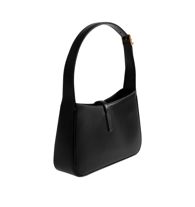 Image 2 of 3 - BLACK - SAINT LAURENT LE 5 7 leather shoulder bag featuring gold hardware, leather tab with THE CASSANDRE, and tonal suede lining. Compact and SPACIOUS, it features an interior zipped pocket and adjustable shoulder strap. Dimensions: 9 x 6.2 x 2.5 inches with 7.8 inch strap drop. Calfskin leather. Made in Italy.