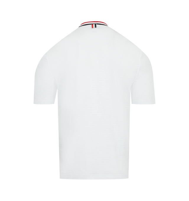 Image 2 of 3 - WHITE - THOM BROWNE Striped Trim Tee featuring chest patch pocket, name tag applique, buttoned side vents with signature striped grosgrain trim, short sleeves and signature striped grosgrain loop tab. 100% cotton. Made in Italy.