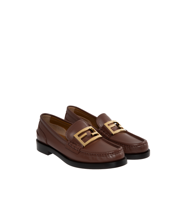 Image 2 of 4 - BROWN - Fendi Loafers with visible stitched apron and vamp embellished with FF motif. Made of 100% calf leather. Gold-finish metalware. Rubber sole. 25mm heel. Made in Italy. 