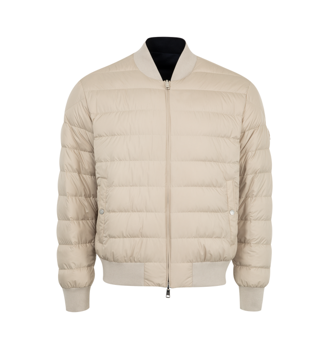 Image 4 of 4 - NAVY - Moncler Villerest Bomber has a baseball collar, a 2-way zip front, side pockets, band-finished cuffs and hem, and a leather logo patch. Down and feather fill. Nylon, polyamide, cashmere, and leather. Made in Romania.