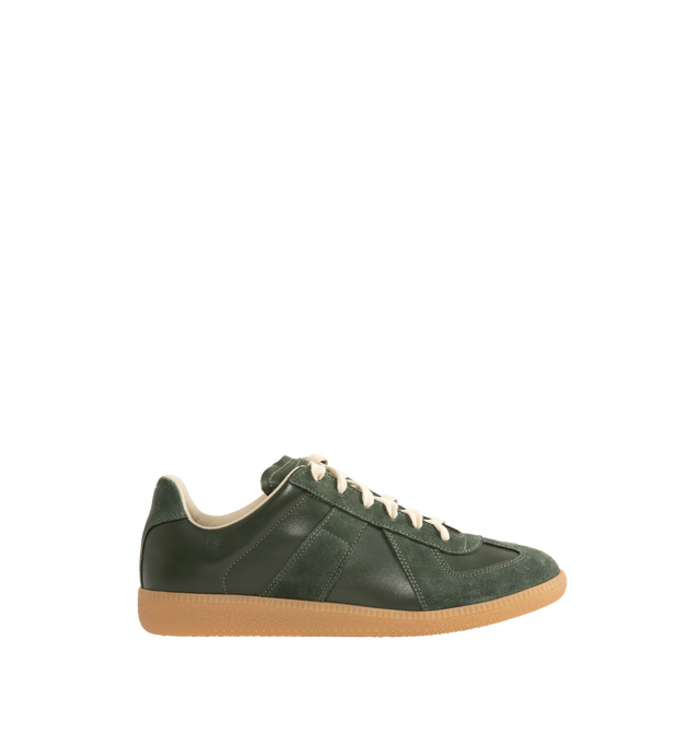 Image 1 of 5 - GREEN - Maison Margiela Men's Replica Sneakers featuring lace-up sneakers in buffed nappa calfskin and calfskin suede, contrasting sole, Maison Margiela logo label on the tab, internal Replica label, internal elastic and all-over Maison Margiela logo insole. 100% calf leather. Sole: 100% rubber. Made in Italy.
